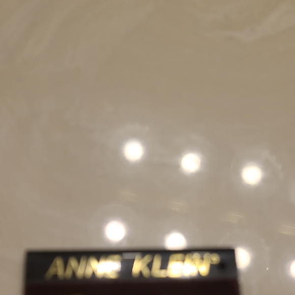 Anne Klein Gold Lion Motif Clip Earrings - Picture 2 of 4